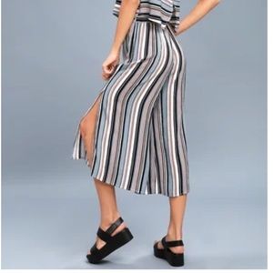 Lulus I stripped cropped high waisted pants w/ a slit